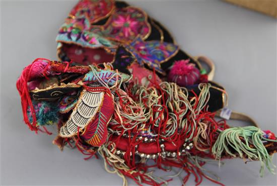 A group of Ethnic Chinese embroidered silk hats